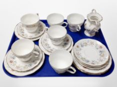 Eighteen pieces of Duchess floral-decorated tea china and a Coalport twin-handled urn.