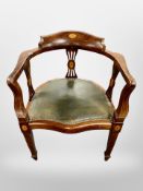 A late Victorian mahogany and satin wood-strung armchair with studded vinyl seat