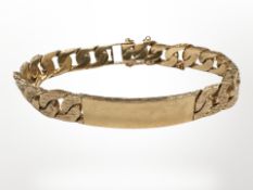 A 9ct gold textured identity bracelet. CONDITION REPORT: 47g.