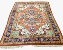 A 20th century woolen carpet of Persian design,