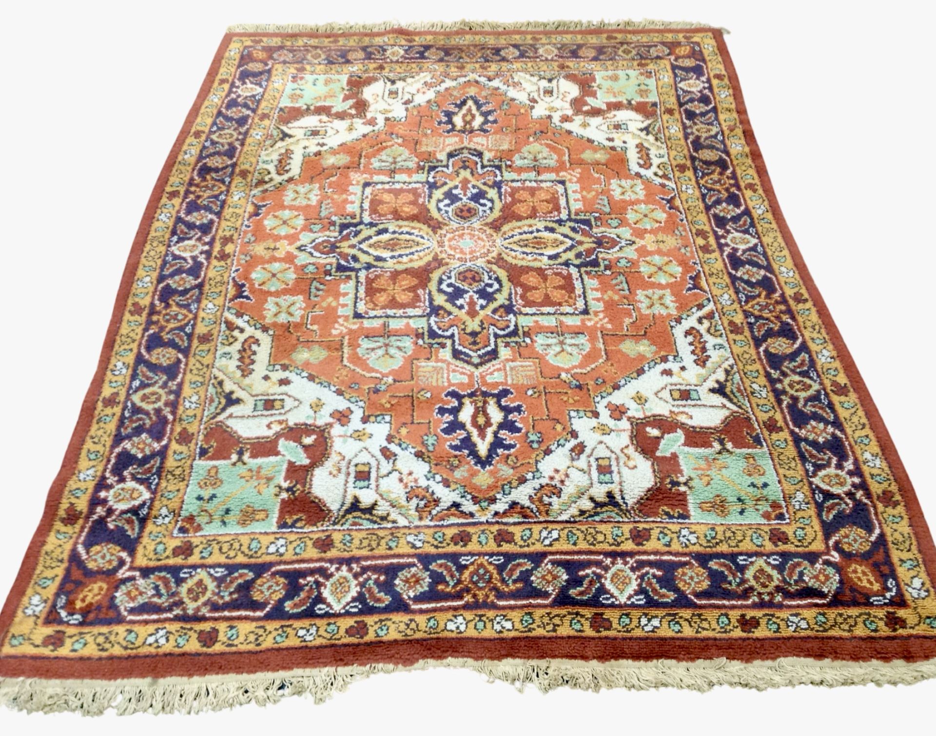 A 20th century woolen carpet of Persian design,