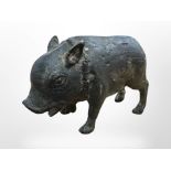 An antique bronze figure of a boar, probably Roman, length 9 cm, height 6 cm.