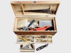 Two antique joiner's tool boxes containing carpentry tools and woodworking planes including Stanley