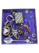 A small box of costume jewellery, plated vesta,