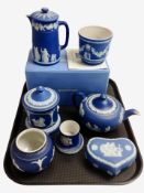 Seven pieces of Wedgwood blue and white Jasperware including teapot, heart-shaped trinket box, etc.