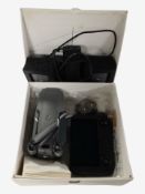 A DJI Mavic 2 drone with handset, instructions and related accessories.