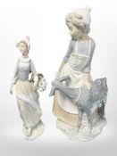A Nao figure of a girl and a goat, and a further Lladró figure of a girl carrying tulips,