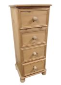 A contemporary pine four drawer narrow chest,