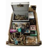 A box of assorted costume jewellery, sunglasses, necklaces, pendants, bangles, etc.