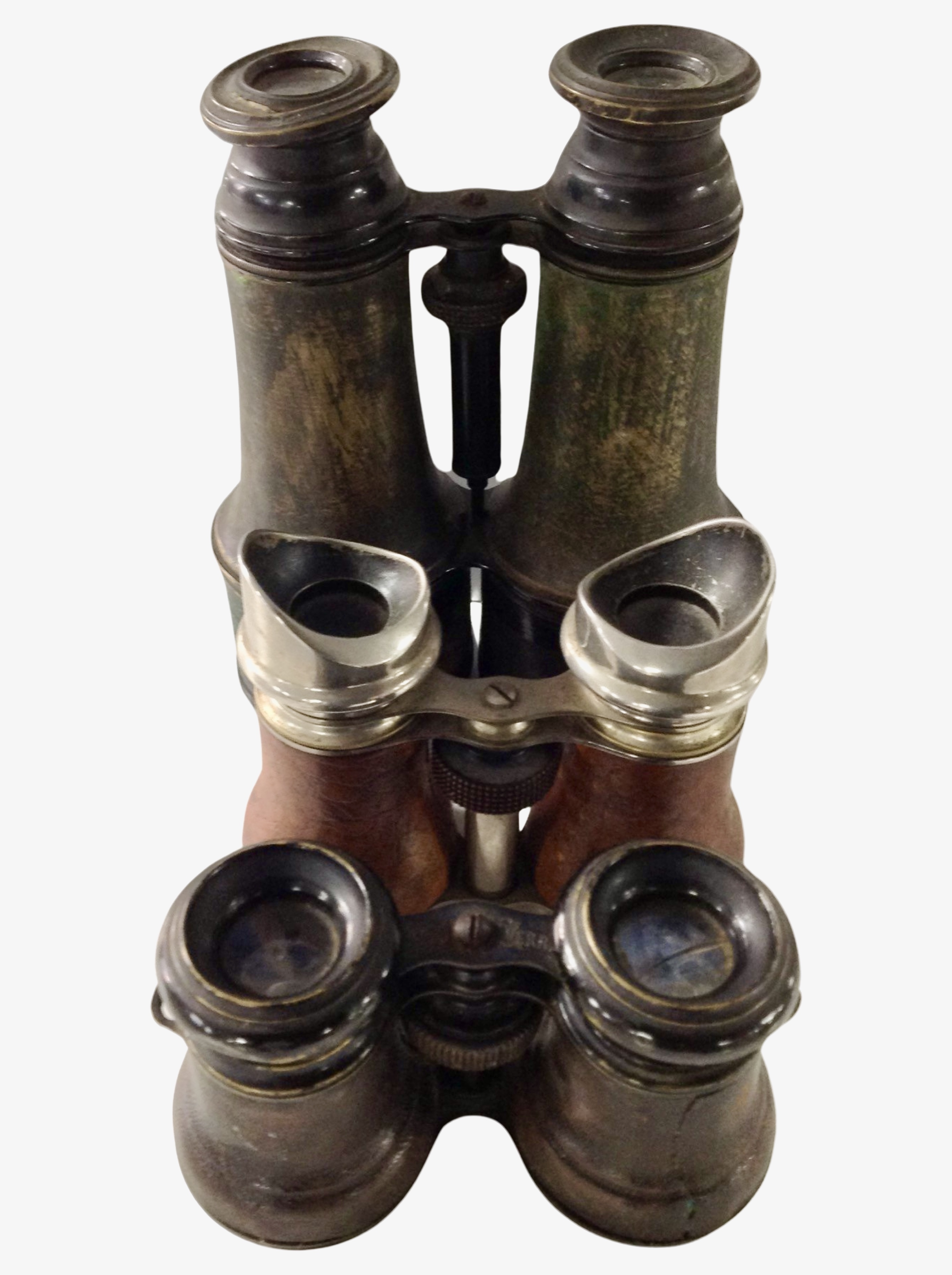 Three pairs of antique field glasses.