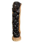 A Makonde Tribe tree of life carving, height 36cm.