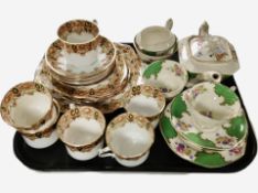 An antique diamond china Imari part tea set, and a James Kent part tea set.
