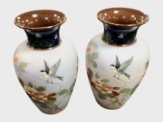 A pair of Aesthetic movement glazed earthenware baluster vases, height 35cm.