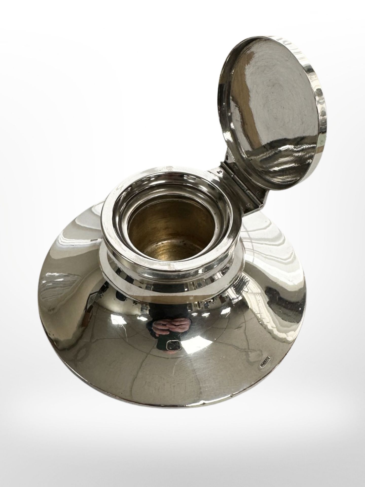 An Italian silver-plated capstan inkwell by Franzi, diameter 11cm.