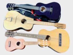 Four various guitars.