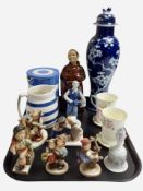 A group of West German Goebel figures, a Chinese blue and white lidded vase decorated with prunus,