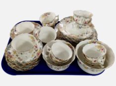 38 pieces of late 19th-century floral-decorated tea china.