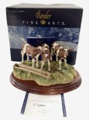 A Border Fine Arts figure 'Ayrshire Calves', boxed with certificate.