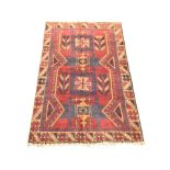 A Baluchi rug 137 cm x 88 cm