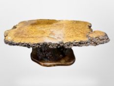 A contemporary burr walnut coffee table,