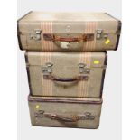 Three Revelation canvas luggage cases