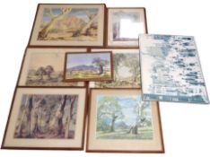 A group of oak-framed prints.