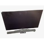 An LG 49 inch LCD TV with lead,