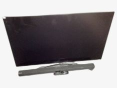 An LG 49 inch LCD TV with lead,