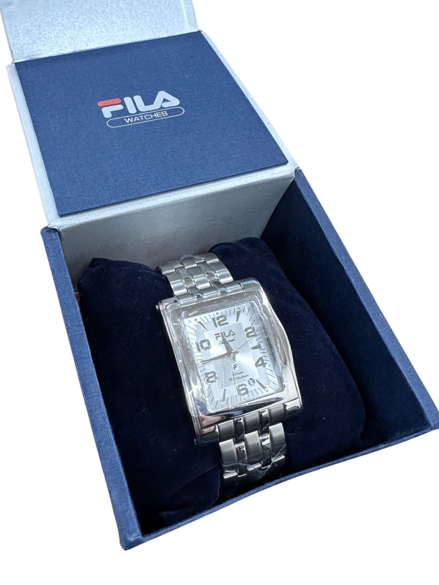 A gentlemen's Fila wristwatch, in retail box.