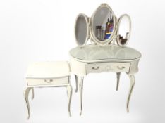 A French style painted kidney shaped mirror backed dressing table and matching bedside chest