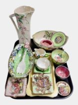 A collection of Maling lustre ceramics in various colours.