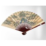 A large oriental lacquered hand fan, width 130cm.