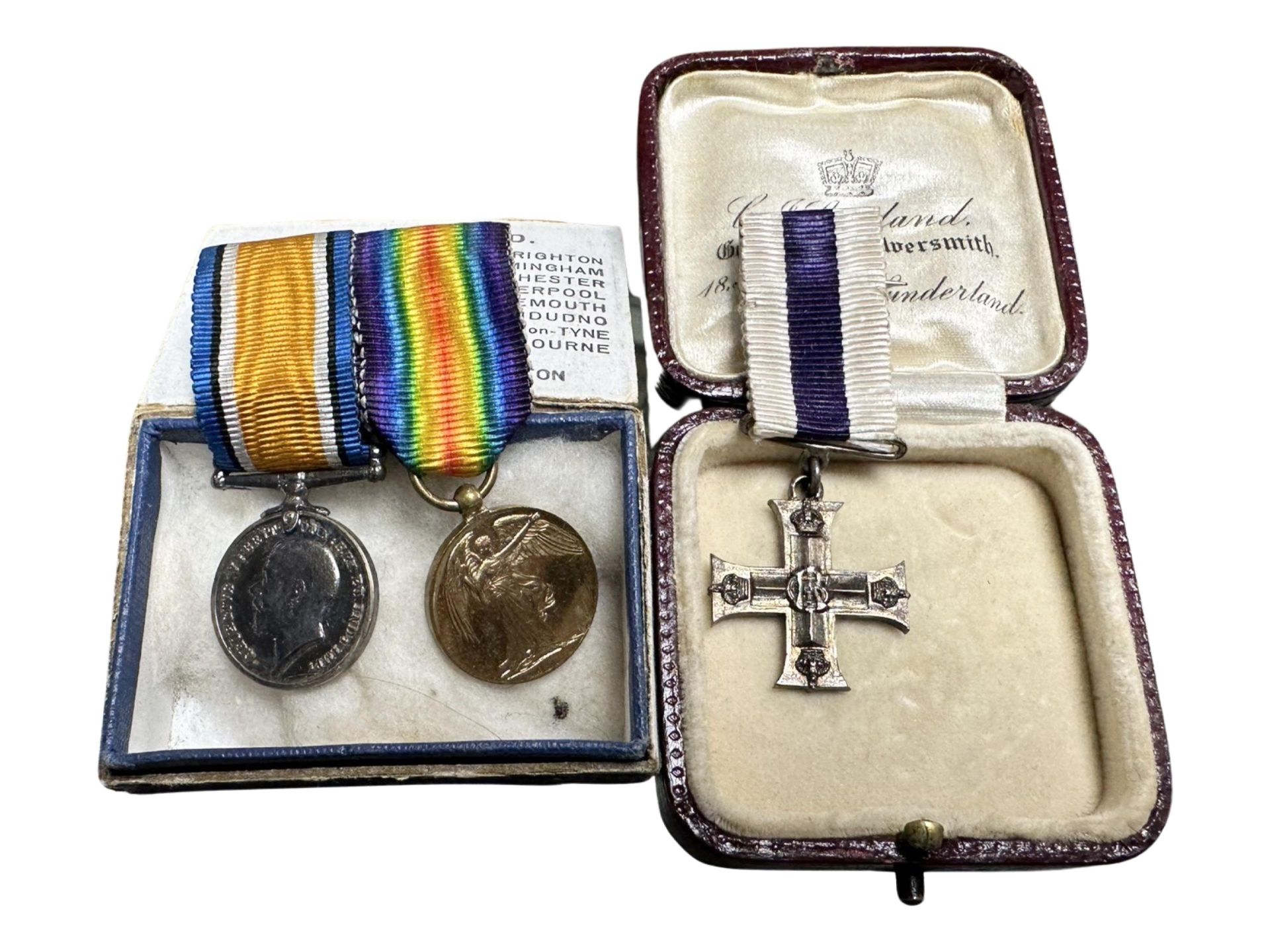 A group of three WWI miniature medals comprising Military Cross with inscription verso, 'Capt. P. W.