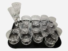 A group of crystal including pair of tall-stem champagne glasses, grapefruit dishes, etc.