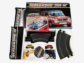 A Scalextric 300 racing set and two further boxes of track and components