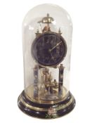 A brass mantel clock under glass dome with zodiac dial, height 31cm.