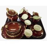 23 pieces of Carlton Ware Rouge Royale tea china, and a similar Royal Winton Rouge dish.