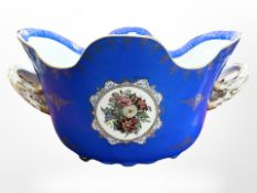 A Meissen style hand painted and gilt porcelain table centre piece,