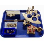 A brass sextant, together with other items including wristwatches, money box, cufflinks, etc.