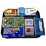 A quantity of glass marbles, two Tonka tin plate trucks, a bridge box, hand magnifier, etc.