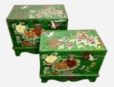 A graduated pair of Chinese style high gloss lacquered chests,