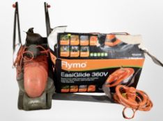 Two Flymo garden mowers and a hedge trimmer