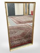 A contemporary gilt-framed mirror, 53cm x 92cm.