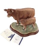 A Border Fine Arts figure, 'Limousin Cow and Calf', limited edition No.