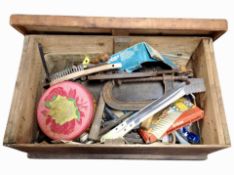 A pine crate containing assorted joinery tools, cutlery, etc.