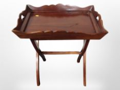A reproduction mahogany butler's tray on stand,