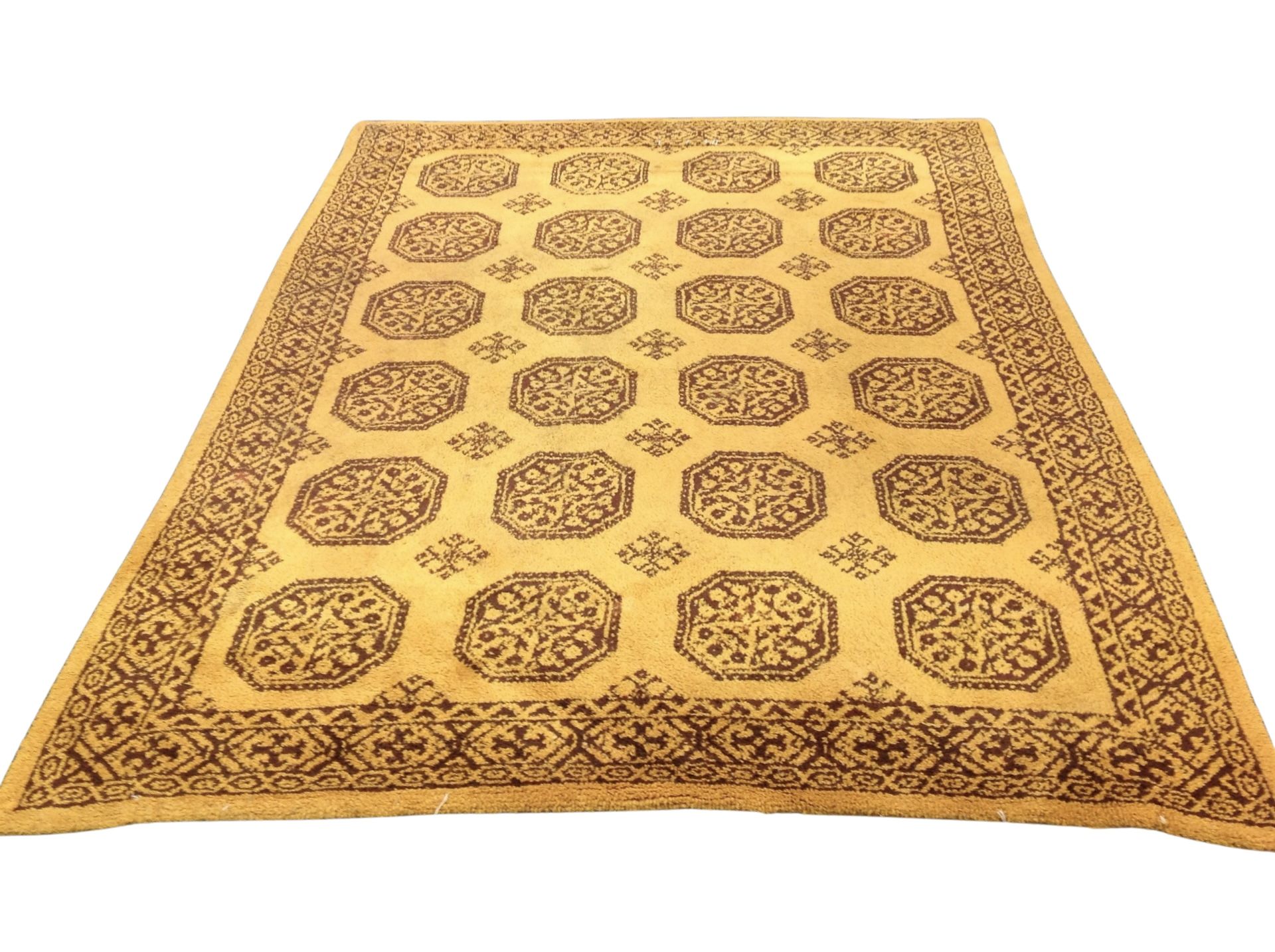 A 20th century woolen carpet of Afghan design,