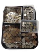 A tray of assorted British and world coins including collectable 50p pieces, etc.
