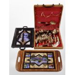 Two butterfly wing serving trays together with a canteen of Siam brass cutlery.