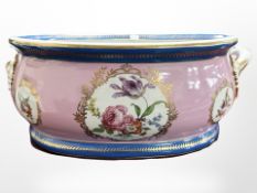 A Meissen style hand painted and gilt porcelain twin handled foot bath,